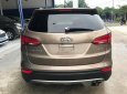 Hyundai Santa Fe 4WD 2014 - Cần bán lại xe Hyundai Santa Fe 4WD sản xuất 2014, màu nâu, giá chỉ 980 triệu