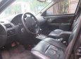Ford Mondeo V6 2005 - Bán Ford Mondeo V6 2005, màu nâu chính chủ giá cạnh tranh