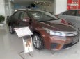 Toyota Corolla altis 2017 - Bán Toyota Corolla Altis sản xuất 2017, màu nâu, 669tr