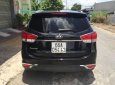 Kia Rondo   2014 - Bán Kia Rondo đời 2014, màu đen số tự động