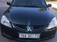 Mitsubishi Lancer 2004 - Bán Mitsubishi Lancer đời 2004, màu đen số tự động, 199tr