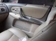 Ford Laser GHIA 1.8 MT 2004 - Cần bán gấp Ford Laser GHIA 1.8 MT năm 2004, màu đen