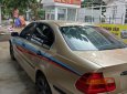 BMW 3 Series 318i 2002 - Cần bán BMW 3 Series 318i đời 2002, màu vàng, nhập khẩu nguyên chiếc