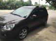 Kia Carens EX 2010 - Bán Kia Carens EX đời 2010, màu nâu như mới