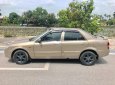 Mazda 323 Classic GLX 2003 - Chính chủ bán Mazda 323 Classic GLX đời 2003, màu vàng