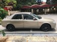 Mazda 323 Classic GLX 2003 - Chính chủ bán Mazda 323 Classic GLX đời 2003, màu vàng