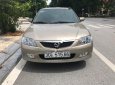 Mazda 323 Classic GLX 2003 - Chính chủ bán Mazda 323 Classic GLX đời 2003, màu vàng