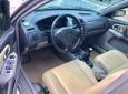Mazda 323 Classic GLX 2003 - Chính chủ bán Mazda 323 Classic GLX đời 2003, màu vàng