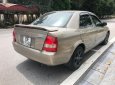 Mazda 323 Classic GLX 2003 - Chính chủ bán Mazda 323 Classic GLX đời 2003, màu vàng