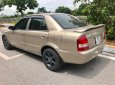 Mazda 323 Classic GLX 2003 - Chính chủ bán Mazda 323 Classic GLX đời 2003, màu vàng