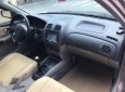 Mazda 323 Classic GLX 2003 - Chính chủ bán Mazda 323 Classic GLX đời 2003, màu vàng