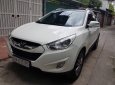 Hyundai Tucson LX20 2010 - Cần bán xe Hyundai Tucson LX20 năm 2010, màu trắng, nhập khẩu nguyên chiếc