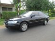 Toyota Camry 1998 - Bán xe Toyota Camry đời 1998, màu đen xe gia đình