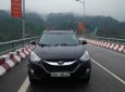 Hyundai Tucson 2.0 AT 4WD 2011 - Bán Hyundai Tucson 2.0 AT 4WD 2011, màu đen, nhập khẩu