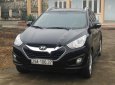 Hyundai Tucson 2.0 AT 4WD 2011 - Bán Hyundai Tucson 2.0 AT 4WD 2011, màu đen, nhập khẩu
