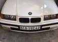 BMW 3 Series  320i  1995 - Bán BMW 320i đời 1995, màu trắng, xe nhập chính chủ