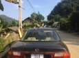 Mazda 323 1.6 MT 1998 - Bán xe Mazda 323 1.6 MT năm 1998, màu đen