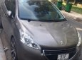 Peugeot 208 2014 - Cần bán lại xe Peugeot 208 đời 2014, màu nâu