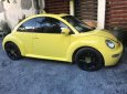 Volkswagen Beetle MT 2005 - Cần bán Volkswagen Beetle MT đời 2005, màu vàng số sàn giá cạnh tranh