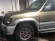 Isuzu Trooper 2002 - Bán xe Isuzu - Trooper đời 2002, máy xăng, màu vàng