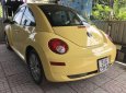 Volkswagen Beetle 2009 - Cần bán gấp Volkswagen Beetle đời 2009, màu vàng, giá chỉ 550 triệu