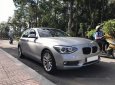 BMW 1 Series 116i 2014 - Cần bán xe BMW 1 Series 116i đời 2014, màu bạc