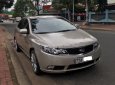 Kia Forte SX 2010 - Cần bán lại xe Kia Forte SX đời 2010, màu vàng