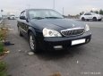 Daewoo Magnus 2.0 MT 2004 - Bán Daewoo Magnus 2.0 MT đời 2004, màu đen như mới, 178 triệu