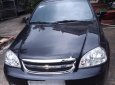 Chevrolet Lacetti 2014 - Cần bán xe Chevrolet Lacetti sản xuất 2014, màu đen xe gia đình