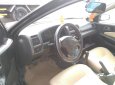 Mazda 323F 2001 - Cần bán xe Mazda 323F đời 2001, màu đen, giá 125tr