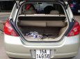 Nissan Tiida 1.8AT 2009 - Bán Nissan Tiida 1.8AT đời 2009, màu vàng, xe nhập