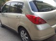 Nissan Tiida 1.8AT 2009 - Bán Nissan Tiida 1.8AT đời 2009, màu vàng, xe nhập