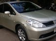 Nissan Tiida 1.8AT 2009 - Bán Nissan Tiida 1.8AT đời 2009, màu vàng, xe nhập