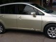 Nissan Tiida 1.8AT 2009 - Bán Nissan Tiida 1.8AT đời 2009, màu vàng, xe nhập