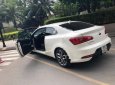 Kia Cerato Koup 2.0 AT 2014 - Cần bán gấp Kia Cerato Koup 2.0 AT năm 2014, màu trắng, nhập khẩu chính chủ