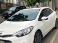 Kia Cerato  2.0 AT  2014 - Cần bán lại xe Kia Cerato 2.0 AT đời 2014, màu trắng 