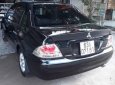 Mitsubishi Lancer  gala 2005 - Bán Mitsubishi Lancer gala đời 2005, màu đen xe gia đình, 250 triệu