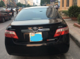 Toyota Camry GLX 2009 - Cần bán gấp Toyota Camry GLX đời 2009, màu đen chính chủ
