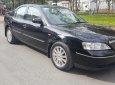 Ford Mondeo 2004 - Bán Ford Mondeo đời 2004, màu đen, ai có nhu cầu liên hệ 0913715808 anh Quý