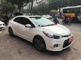 Kia Cerato Koup 2.0 AT 2015 - Cần bán lại xe Kia Cerato Koup 2.0 AT đời 2015, màu trắng, nhập khẩu nguyên chiếc chính chủ, giá 630tr