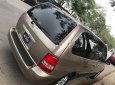 Kia Carnival GS 2.5 AT 2009 - Bán Kia Carnival GS 2.5 AT 2009, màu nâu số tự động