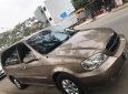 Kia Carnival GS 2.5 AT 2009 - Bán Kia Carnival GS 2.5 AT 2009, màu nâu số tự động