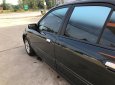 Mazda 323 2004 - Bán Mazda 323 đời 2004, màu đen, xe nhập, giá tốt