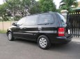 Kia Carnival GS 2.5 MT 2007 - Bán ô tô Kia Carnival GS 2.5 MT đời 2007, màu đen ít sử dụng