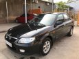 Mazda 323 2004 - Bán Mazda 323 đời 2004, màu đen, xe nhập, giá tốt
