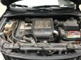 Kia Carens LX 2005 - Cần bán lại xe Kia Carens LX sản xuất 2005, màu đen, nhập khẩu, số tự động