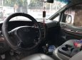 Hyundai Starex 2004 - Bán ô tô Hyundai Starex đời 2004, màu bạc số sàn