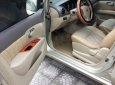 Nissan Grand livina  MT 2011 - Cần bán gấp Nissan Livina 2011, màu vàng cát, còn mới