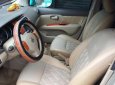 Nissan Grand livina  MT 2011 - Cần bán gấp Nissan Livina 2011, màu vàng cát, còn mới