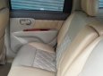 Nissan Grand livina  MT 2011 - Cần bán gấp Nissan Livina 2011, màu vàng cát, còn mới